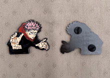 Load image into Gallery viewer, 2.5-inch hard-enamel pin of Itadori Yuji from the anime Jujutsu Kaisen (JJK). Front and back of the pin shown with two pin posts. Nickel pin with black plating. Anime, Sorcerer, Toji, Shibuya, curse, sukuna, finger, collector, LE, limited run
